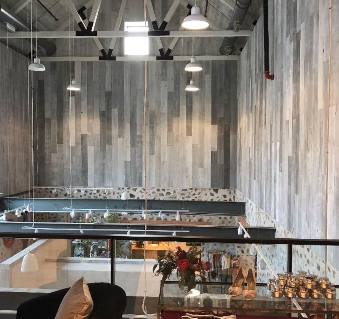 Reclaimed Gray Barn Siding at Anthropologie Devon Yard Reclaimed Gray Barn Siding at Anthropologie Devon Yard